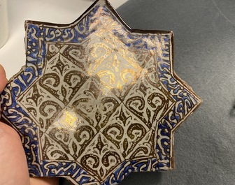 A star-shaped luster-glazed tile, Kashan, Iran, 14th C.
